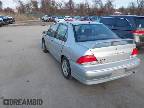 2003 Mitsubishi Lancer OZ-Rally with VIN JA3AJ86E63U022390, listed as a IAAI auction lot 41542407 with 184,639 mi miles. Bid and sale history available at carsss.com. Image 3.