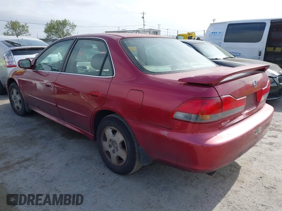 2002 Honda Accord EX z VIN 1HGCG16512A055542, wystawiony jako IAAI lot #42121839 z przebiegiem 196 264 mil mil oraz . Historia ofert i sprzedaży dostępna na DreamBid. Obrazek 3.
