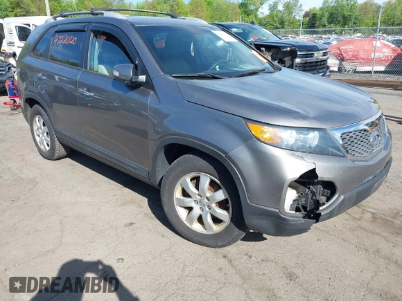 2012 Kia Sorento LX with VIN 5XYKT3A65CG266682, listed as a IAAI auction lot 42220120 with 118,153 mi miles and . Bid and sale history available at carsss.com. Image 1.
