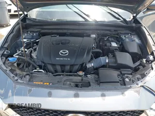 2022 Mazda CX-30 S Carbon Edition with VIN 3MVDMBCL6NM410330, listed as a IAAI auction lot 42107426 with 30,277 mi miles and . Bid and sale history available at DreamBid. Image 10.