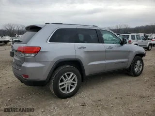 2018 Jeep Grand Cherokee Laredo E with VIN 1C4RJFAGXJC258058, listed as a Copart auction lot 83106674 with 92,457 mi miles and Salvage Title. Bid and sale history available at carsss.com. Image 3.