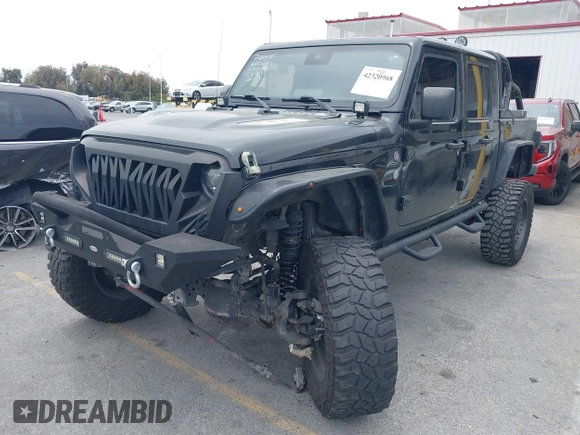 2020 Jeep Gladiator Rubicon z VIN 1C6JJTBG7LL102189, wystawiony jako IAAI lot #42320968 z przebiegiem 68 266 mil mil oraz . Historia ofert i sprzedaży dostępna na DreamBid. Obrazek 17.
