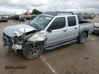 2002 Nissan Frontier SE with VIN 1N6ED27T92C379360, listed as a Copart auction lot 51235495 with 230,598 mi miles and Salvage title. Bid and sale history available at DreamBid. Image 1.