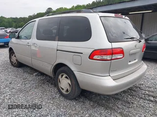 2002 Toyota Sienna LE with VIN 4T3ZF13C92U434076, listed as a IAAI auction lot 42132585 with 243,661 mi miles and . Bid and sale history available at DreamBid. Image 3.