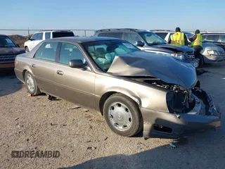 2002 Cadillac DeVille DHS z VIN 1G6KE57Y52U283531, wystawiony jako IAAI lot #41640930 z przebiegiem 94 435 mil mil oraz . Historia ofert i sprzedaży dostępna na DreamBid. Obrazek 1.