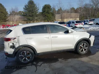 2021 Kia Sportage LX with VIN KNDPMCACXM7901175, listed as a IAAI auction lot 41588890 with 94,404 mi miles and . Bid and sale history available at carsss.com. Image 13.
