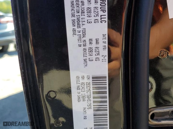 2011 Dodge Charger RT Max with VIN 2B3CM5CT5BH517976, listed as a Copart auction lot 74145784 with 134,924 mi miles and Salvage Title. Bid and sale history available at carsss.com. Image 13.