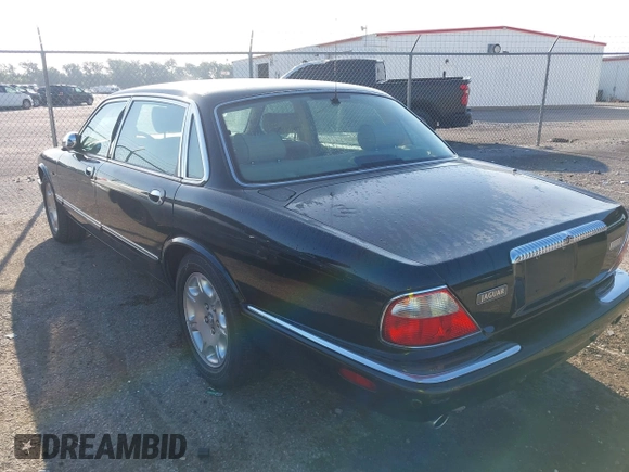 2001 Jaguar XJ Vanden Plas with VIN SAJDA24C81LF23026, listed as a IAAI auction lot 42671098 with 83,759 mi miles and . Bid and sale history available at DreamBid. Image 3.