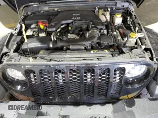 2021 Jeep Gladiator Willys with VIN 1C6HJTAG4ML556255, listed as a Copart auction lot 57143125 with 57,104 mi miles and Salvage title. Bid and sale history available at DreamBid. Image 11.