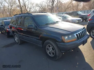 2001 Jeep Grand Cherokee Laredo with VIN 1J4GW48S51C517217, listed as a IAAI auction lot 41773968 with 189,350 mi miles. Bid and sale history available at carsss.com. Image 1.