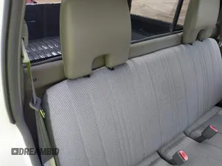 2000 Nissan Frontier XE z VIN 1N6DD21S4YC386902, wystawiony jako IAAI lot #42197752 z przebiegiem 164 055 mil mil oraz . Historia ofert i sprzedaży dostępna na DreamBid. Obrazek 8.