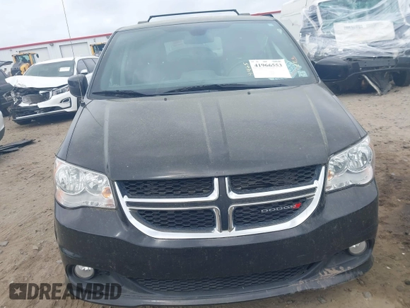 2018 Dodge Grand Caravan SXT with VIN 2C4RDGCGXJR283091, listed as a IAAI auction lot 41966553 with 102,309 mi miles and . Bid and sale history available at DreamBid. Image 12.