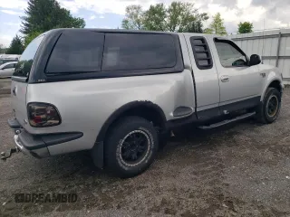 2000 Ford F-150 XL with VIN 2FTRX08L2YCA22507, listed as a Copart auction lot 55390075 with 197,785 mi miles and Salvage title. Bid and sale history available at DreamBid. Image 3.