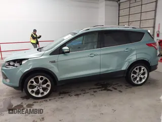 2013 Ford Escape Titanium with VIN 1FMCU9J9XDUC60029, listed as a IAAI auction lot 41936948 with 184,012 mi miles and . Bid and sale history available at DreamBid. Image 14.