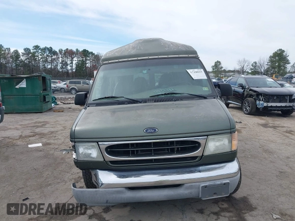 2002 Ford Econoline Passenger XL with VIN 1FMRE11L82HA83636, listed as a IAAI auction lot 41718025 with 153,581 mi miles and . Bid and sale history available at DreamBid. Image 12.