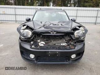 2018 MINI Countryman Cooper S z VIN WMZYT3C30J3E00127, wystawiony jako Copart lot #80122944 z przebiegiem 87 121 mil mil oraz Szkody całkowita. Historia ofert i sprzedaży dostępna na DreamBid. Obrazek 5.