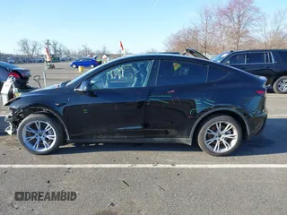 2023 Tesla Model Y Long Range with VIN 7SAYGAEE3PF925928, listed as a IAAI auction lot 41753910 with Not provided miles and . Bid and sale history available at DreamBid. Image 14.