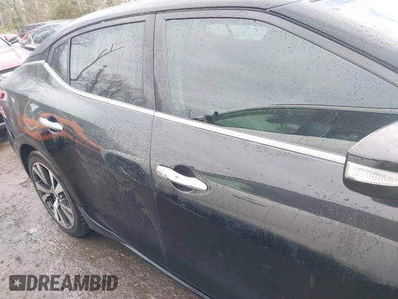 2016 Nissan Maxima Platinum with VIN 1N4AA6AP4GC414574, listed as a IAAI auction lot 41353383 with 153,387 mi miles and . Bid and sale history available at DreamBid. Image 13.
