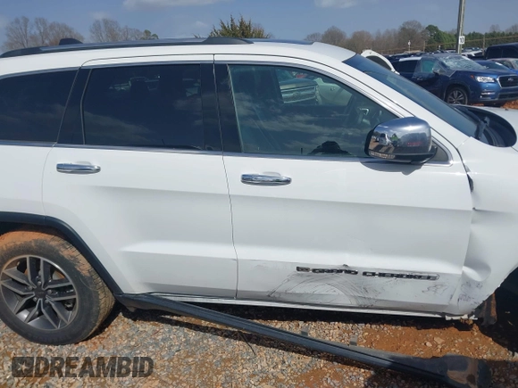 2022 Jeep Grand Cherokee Limited with VIN 1C4RJEBG4NC171643, listed as a IAAI auction lot 41440015 with 52,702 mi miles and . Bid and sale history available at DreamBid. Image 13.