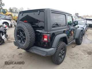 2021 Jeep Wrangler Sport with VIN 1C4GJXAN5MW627228, listed as a IAAI auction lot 42170010 with 56,965 mi miles and . Bid and sale history available at DreamBid. Image 4.
