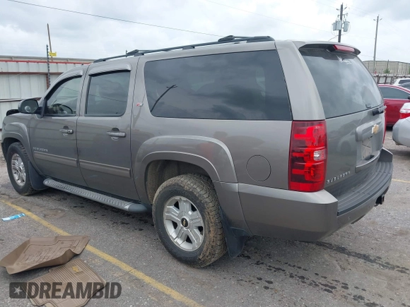 2012 Chevrolet Suburban LT with VIN 1GNSKJE78CR131456, listed as a IAAI auction lot 42152241 with 215,790 mi miles and . Bid and sale history available at DreamBid. Image 3.