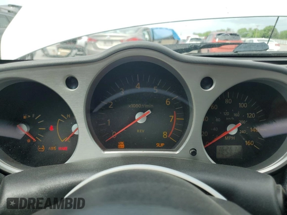 2003 Nissan 350Z Performance z VIN JN1AZ34D63T102739, wystawiony jako Copart lot #55443655 z przebiegiem 162 672 mil mil oraz Tytuł czysty. Historia ofert i sprzedaży dostępna na DreamBid. Obrazek 9.