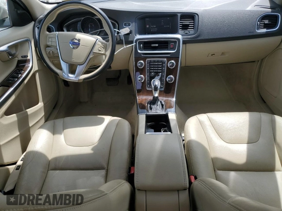 2015 Volvo S60 T5 Drive-E Premier z VIN YV140MFK2F1362846, wystawiony jako Copart lot #56112245 z przebiegiem 39 267 mil mil oraz Szkoda całkowita • Salvage title. Historia ofert i sprzedaży dostępna na DreamBid. Obrazek 8.