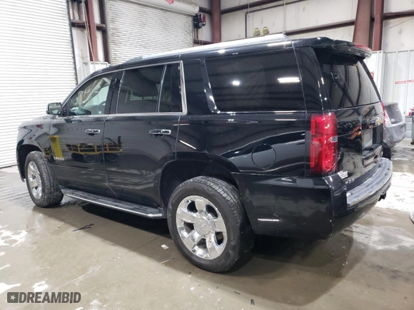2019 Chevrolet Tahoe Premier with VIN 1GNSKCKC0KR222510, listed as a Copart auction lot 85897994 with 106,842 mi miles and Salvage Title. Bid and sale history available at carsss.com. Image 2.