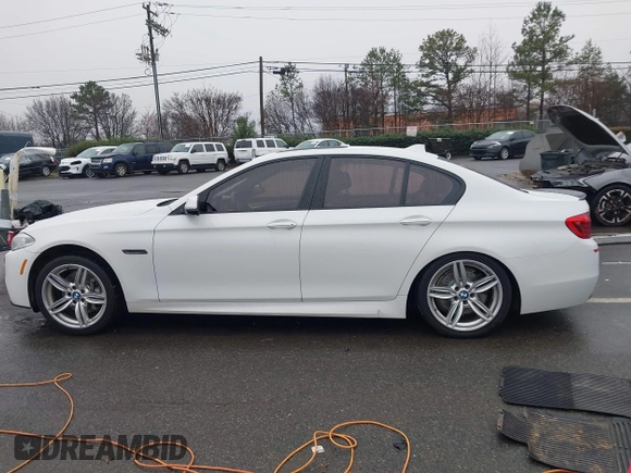 2014 BMW 5 Series 535d with VIN WBAXA5C58ED690612, listed as a IAAI auction lot 41570616 with 95,124 mi miles and . Bid and sale history available at carsss.com. Image 15.