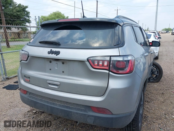 2023 Jeep Compass Latitude with VIN 3C4NJDBN5PT509999, listed as a IAAI auction lot 42206354 with 62,165 mi miles and . Bid and sale history available at DreamBid. Image 4.