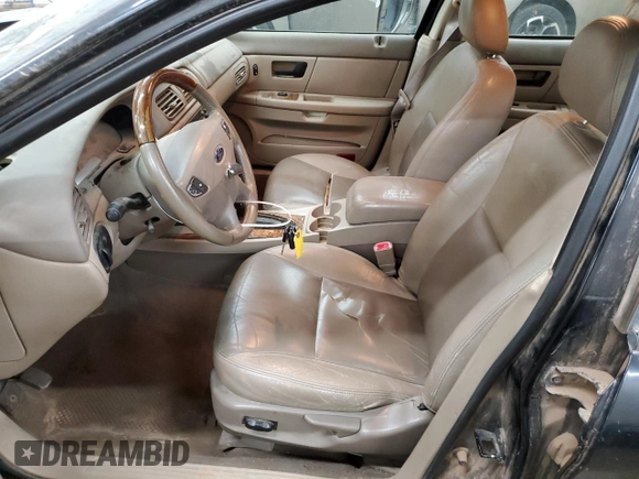 2003 Ford Taurus SEL Deluxe with VIN 1FAHP56S43A219925, listed as a Copart auction lot 76978824 with 191,000 mi miles and Salvage Title. Bid and sale history available at DreamBid. Image 7.