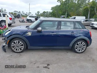 2017 MINI Hardtop 4 Door Cooper with VIN WMWXU1C54H2E19114, listed as a IAAI auction lot 42107266 with 83,524 mi miles and . Bid and sale history available at DreamBid. Image 15.