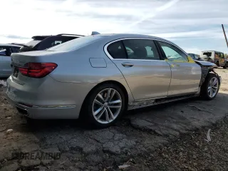 2018 BMW 7 Series 750i with VIN WBA7F0C53JGM22810, listed as a Copart auction lot 72796303 with 63,047 mi miles. Bid and sale history available at carsss.com. Image 3.
