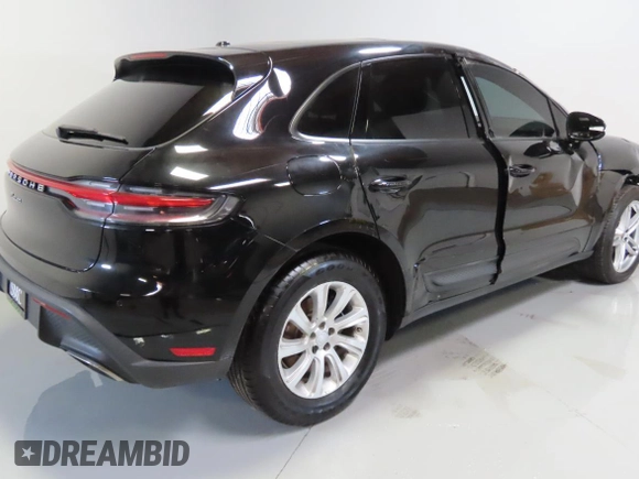 2023 Porsche Macan with VIN WP1AA2A50PLB01554, listed as a Copart auction lot 61992765 with 31,549 mi miles and Salvage title. Bid and sale history available at DreamBid. Image 3.