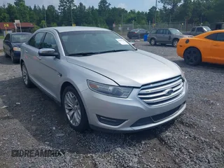 2013 Ford Taurus Limited with VIN 1FAHP2F87DG235392, listed as a IAAI auction lot 42700160 with 123,904 mi miles and . Bid and sale history available at DreamBid. Image 1.