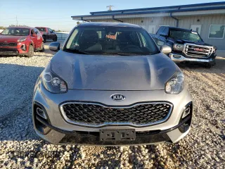2021 Kia Sportage LX with VIN KNDPMCAC0M7945282, listed as a Copart auction lot 79599224 with 84,685 mi miles and Clean Title. Bid and sale history available at carsss.com. Image 5.