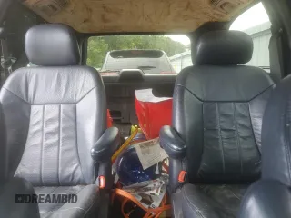 2002 Chrysler Town & Country LXi with VIN 2C8GP54L02R714259, listed as a Copart auction lot 64432084 with 186,781 mi miles and Salvage Title. Bid and sale history available at carsss.com. Image 10.