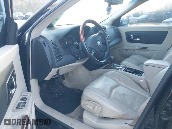2004 Cadillac SRX with VIN 1GYDE63A040116714, listed as a IAAI auction lot 41828311 with 128,372 mi miles. Bid and sale history available at carsss.com. Image 5.