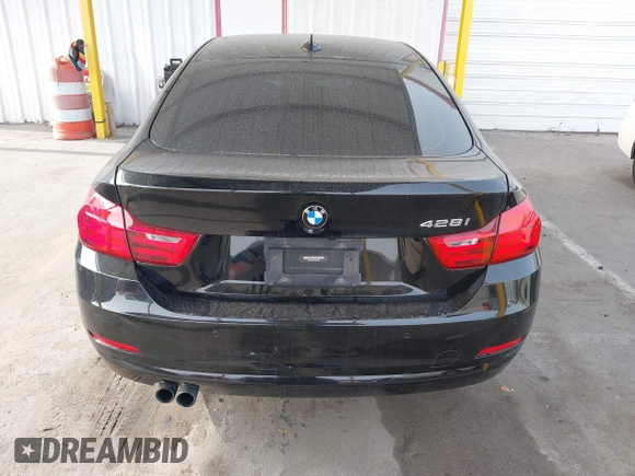 2015 BMW 4 Series 428i with VIN WBA4A9C52FGL85228, listed as a IAAI auction lot 41228043 with 152,729 mi miles and . Bid and sale history available at DreamBid. Image 16.