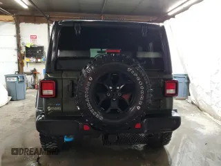 2023 Jeep Wrangler с VIN 1C4JJXN60PW604923, выставлен на аукционе Copart как лот 52259215 с пробегом 22 198 миль миль и Списание • Salvage title. История ставок и продаж доступна на DreamBid. Изображение 6.