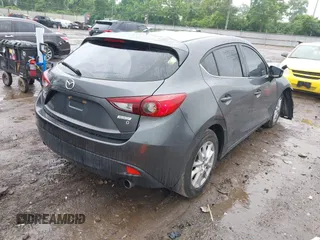2014 Mazda 3 i Touring z VIN JM1BM1L70E1212930, wystawiony jako IAAI lot #42434348 z przebiegiem 107 209 mil mil oraz . Historia ofert i sprzedaży dostępna na DreamBid. Obrazek 4.
