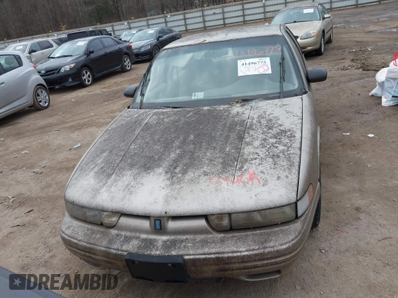 1996 Oldsmobile Cutlass Supreme S z VIN 1G3WH52M9TF377685, wystawiony jako IAAI lot #41496775 z przebiegiem 197 366 mil mil oraz . Historia ofert i sprzedaży dostępna na DreamBid. Obrazek 6.