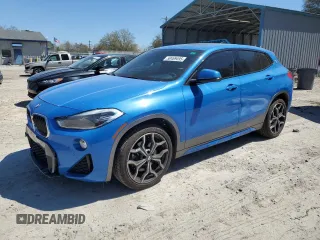 2018 BMW X2 xDrive28i with VIN WBXYJ5C38JEF78411, listed as a Copart auction lot 50469495 with 75,534 mi miles and Salvage Title. Bid and sale history available at carsss.com. Image 1.