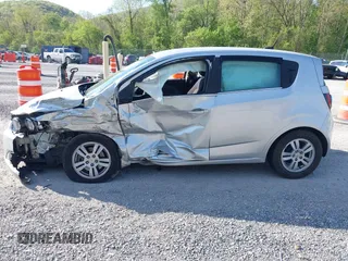 2012 Chevrolet Sonic LT with VIN 1G1JC6SH5C4167574, listed as a IAAI auction lot 42133100 with 59,473 mi miles and . Bid and sale history available at DreamBid. Image 14.