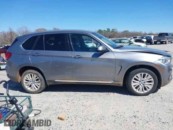 2016 BMW X5 xDrive40e z VIN 5UXKT0C50G0F75010, wystawiony jako IAAI lot #41732410 z przebiegiem 88 671 mil mil oraz . Historia ofert i sprzedaży dostępna na DreamBid. Obrazek 13.