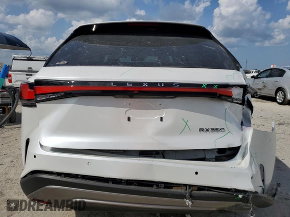 2024 Lexus RX with VIN 2T2BAMBA3RC031454, listed as a Copart auction lot 51141895 with 8,969 mi miles and Salvage Title. Bid and sale history available at carsss.com. Image 6.