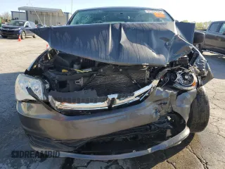 2015 Dodge Grand Caravan American Value with VIN 2C4RDGBG6FR603659, listed as a Copart auction lot 52385735 with 209,818 mi miles and Salvage Title. Bid and sale history available at DreamBid. Image 5.
