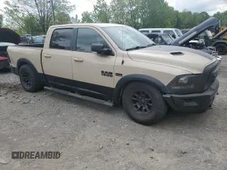2017 Ram 1500 Rebel z VIN 1C6RR7YT0HS611836, wystawiony jako Copart lot #56943955 z przebiegiem 55 548 mil mil oraz Szkoda całkowita • Salvage title. Historia ofert i sprzedaży dostępna na DreamBid. Obrazek 4.