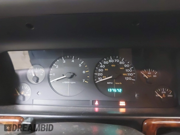1997 Jeep Grand Cherokee Laredo z VIN 1J4GZ58S9VC562907, wystawiony jako IAAI lot #42102313 z przebiegiem 137 672 mil mil oraz . Historia ofert i sprzedaży dostępna na DreamBid. Obrazek 7.