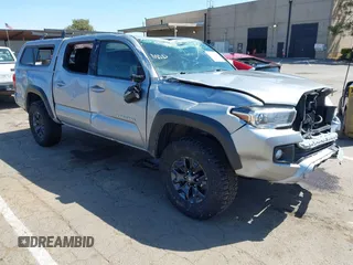 2019 Toyota Tacoma SR z VIN 3TMCZ5AN4KM244356, wystawiony jako IAAI lot #41950548 z przebiegiem Nie podano mil oraz . Historia ofert i sprzedaży dostępna na DreamBid. Obrazek 1.